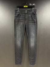 Load image into Gallery viewer, Amiri Faded Black Stacked Denim Jeans 36x34

